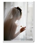 Bride-at-window-329x390.jpg