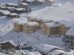 snow-covered-village-mountains-15776632.jpg