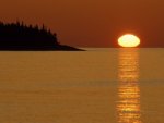 mark-carlson-spring-sunrise-silhouettes-edwards-island-and-reflects-light-on-lake-superior.jpg