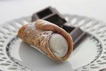 220px-Cannolo_siciliano_with_chocolate_squares.jpg