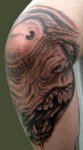 Monster-Elbow-Tattoo-Design.jpg