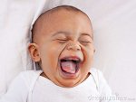 smilling-7-month-old-baby-boy-big-laugh-21182017.jpg