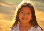 young-girl-smiling-at-camera-1148917-m.jpg