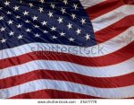 stock-photo-a-waving-american-flag-25277779.jpg