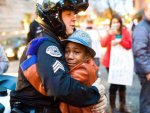 635528724545218809-AP-APTOPIX-Ferguson-Protest-Embrace.jpg