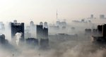 Beijing+Polution+An+aerial+view+of+buildings+standing+out+amid+haze+engulfing+Wuhan,+central+Chi.jpg