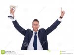 business-man-holding-trophy-19347973.jpg