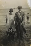 Beach photograph of a photographer, woman and Felix the Cat puppet, c. 1920.jpg