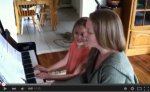 My sister Marie and niece on piano.jpg