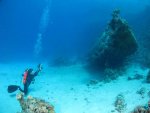 diver with sunken boat.jpg