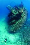 diver exploring ship ruins.jpg