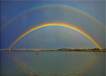 double rainbow over a lake.jpg