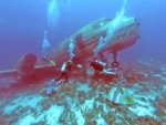 divers exploring plane wreck.jpg