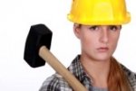 13459380-woman-with-a-sledgehammer.jpg
