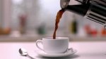 stock-footage-coffee-being-poured-from-cafetiere-into-cup-in-kitchen-in-slow-motion.jpg
