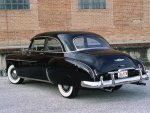 0202_05zoom+1949_chevrolet_deluxe+rear_left_view.jpg