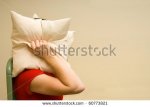 stock-photo-woman-suffering-from-noise-and-covering-her-head-with-a-pillow-irritated-female-lyin.jpg