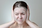 noise-pollution-young-woman-covering-her-ears-39328462.jpg