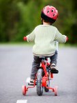 32-boy-riding-bike-red-helmet-lgn-76481941.jpg
