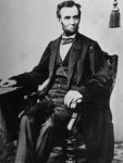 president-abraham-lincoln-sitting-in-a-chair.jpg