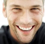 man-smiling-in-black-shirt.jpg man-smiling-in-black-shirt.jpg