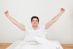 Man-With-Arm-Raised-On-Bed.jpg Man-With-Arm-Raised-On-Bed.jpg