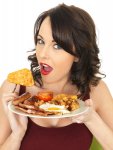 young-happy-surprised-woman-eating-full-english-breakfast-dslr-royalty-free-image-consisting-fri.jpg